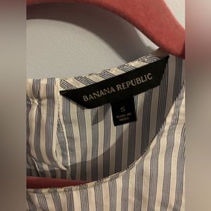 Size Small Banana Republic blue and white striped dress shirt with bows on wrist